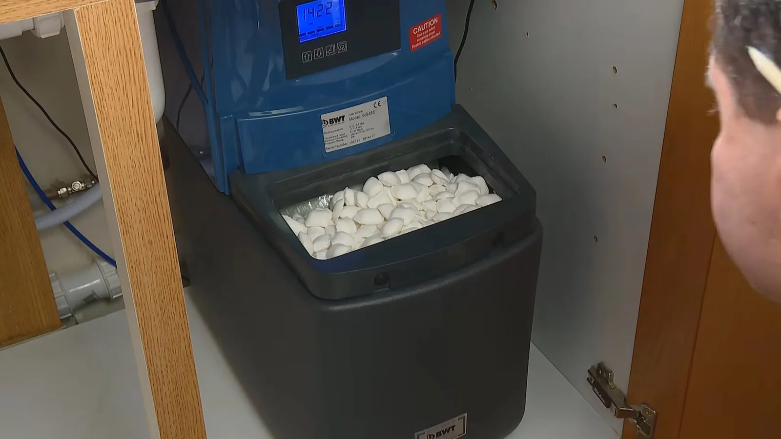 Salt added to a water softener brine tank
