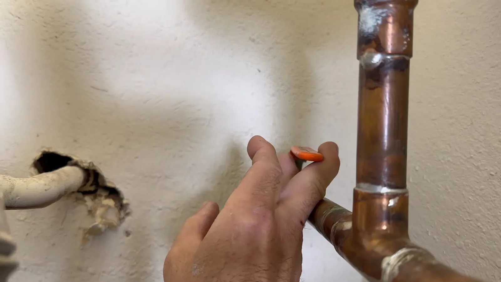 Sediment and mineral scale removed from a water heater tank