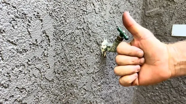Hose bib handle checked for smooth operation after repair