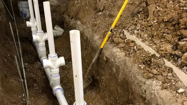Commercial restroom underground drain rough-in