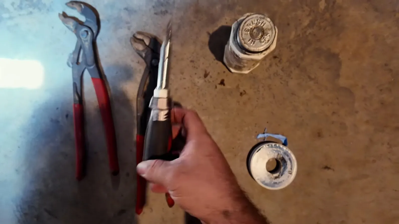 Old gas water heater hose disconnected during a repair
