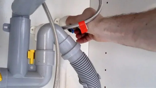 Supply and drain lines disconnected from a sink faucet