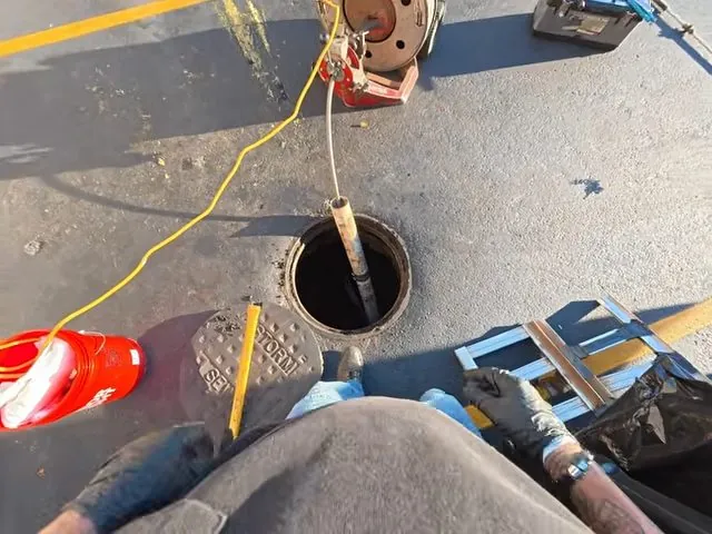 Drain snake fed into a restaurant floor drain