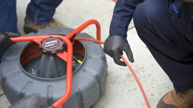 Inspection camera fed into a sewer cleanout