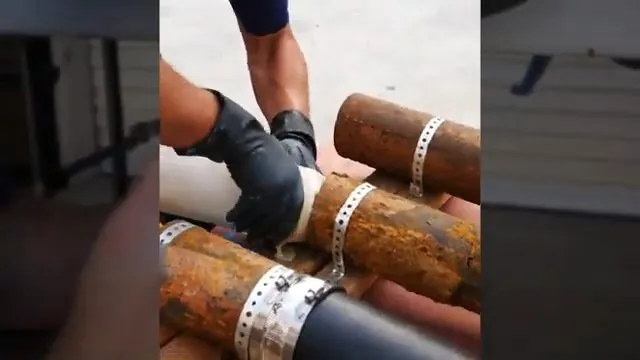 Cured epoxy sewer liner handled at a cut pipe section
