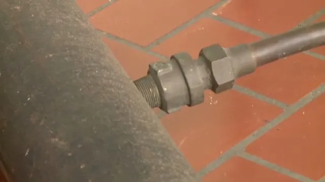Older lead-style water service pipe shown during an inspection
