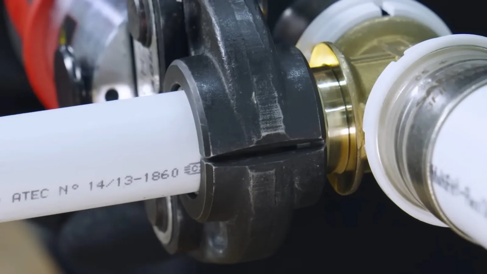 Close-up of plumbing tool fittings laid out before a job