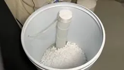 Salt pellets inside a water softener brine tank