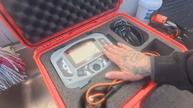 Acoustic water leak detector being set up for a test