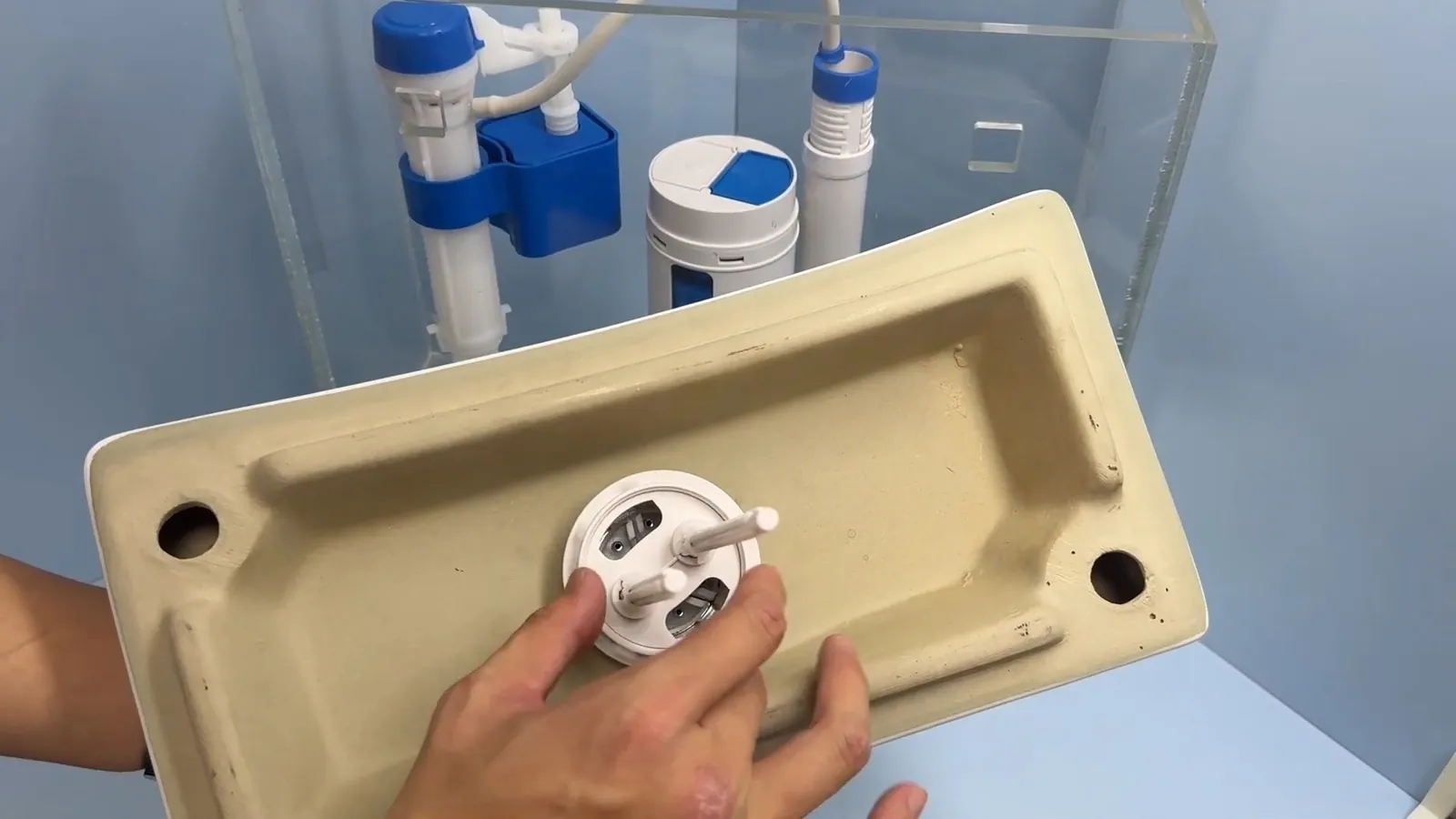 New high-efficiency toilet being installed in a bathroom