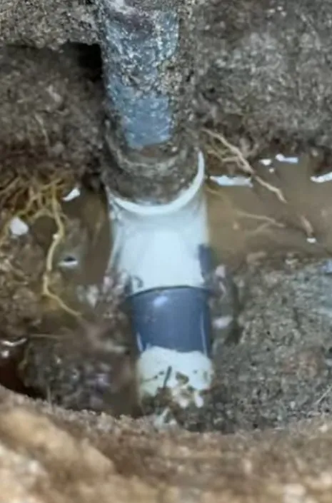 Water leak exposed beneath a concrete slab